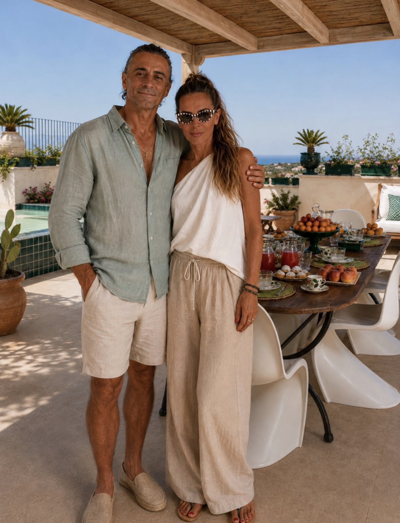Ana and Pedro on a sunny terrace by the sea